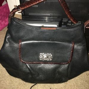 Black fossil handbag leather